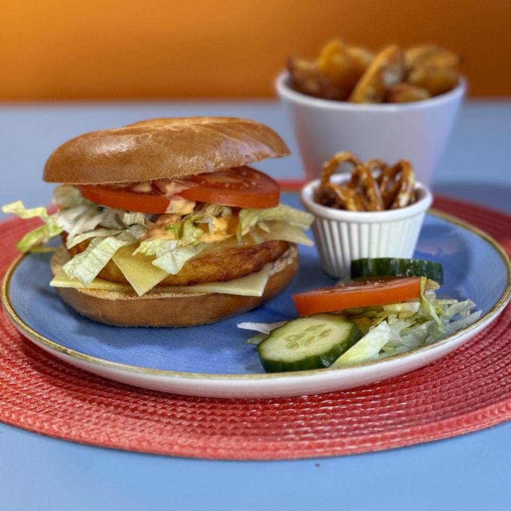 Garden Bagel Burgerwith a juicy potato patty, salad, cheese and mayo, great for vegetarians